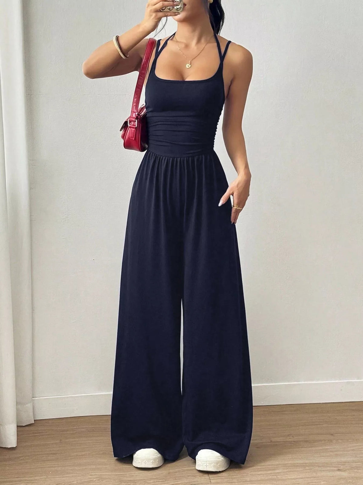 Wide leg jumpsuit spaghetti strap neckline detail