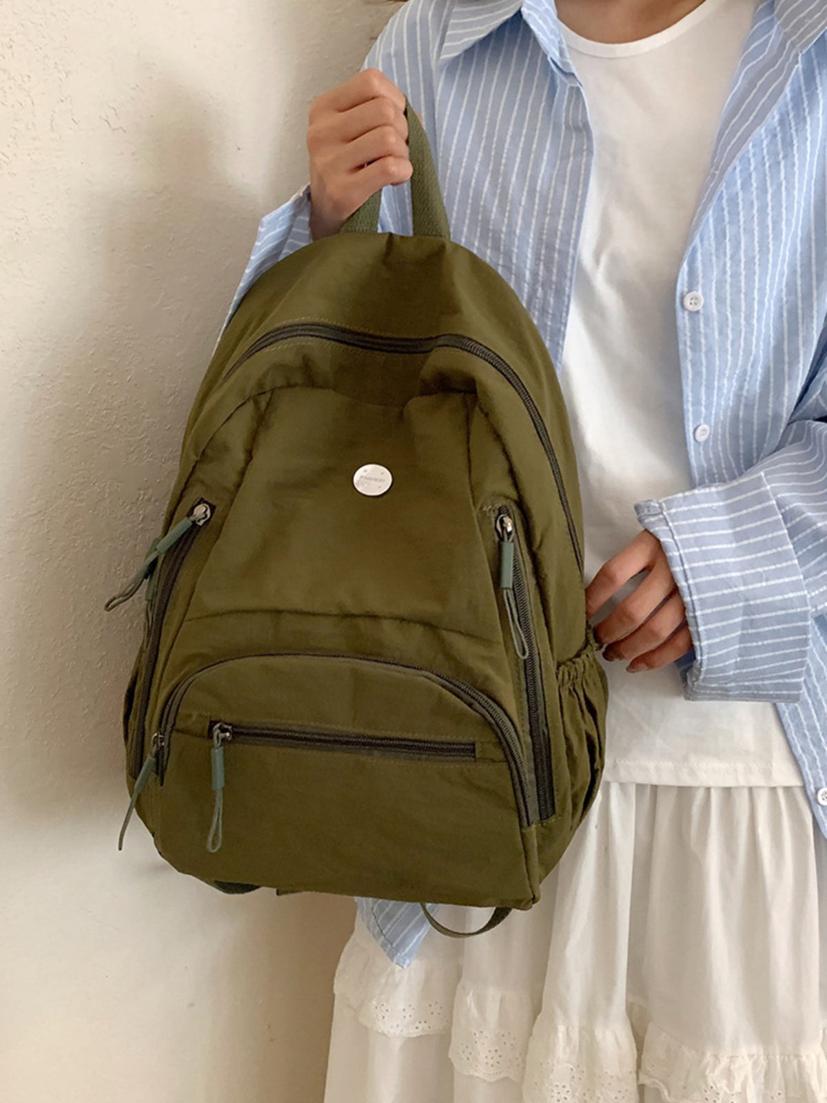 Army green lightweight nylon backpack front view