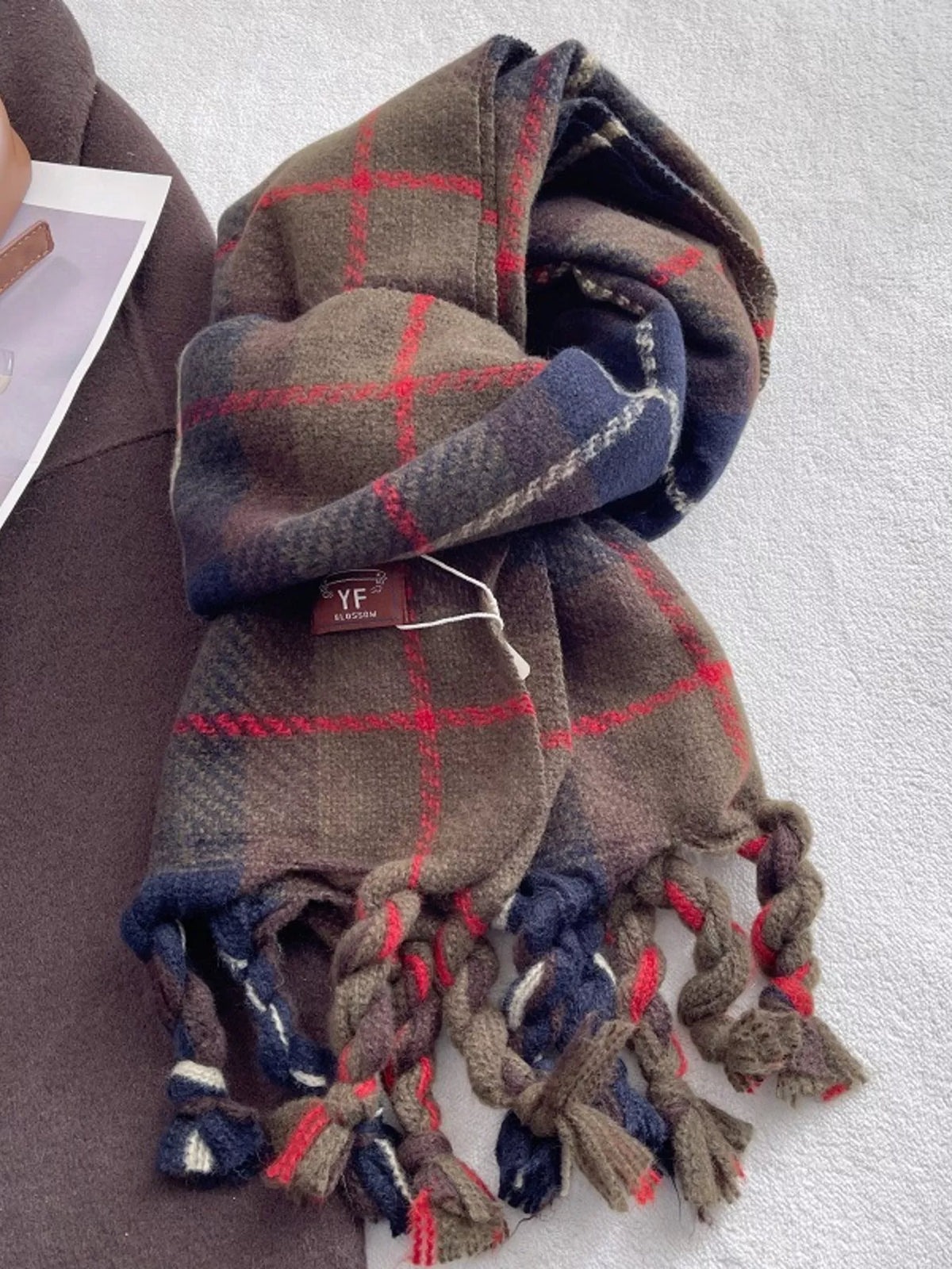 Plaid tassel scarf shown in a cool tone combination
