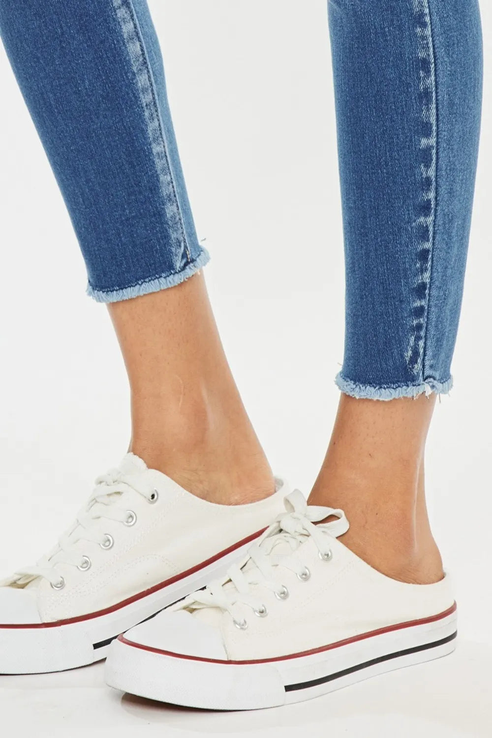 Distressed skinny denim close up