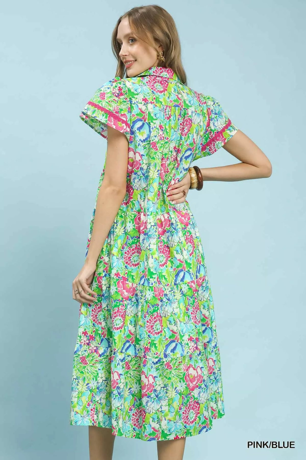 Pink and blue floral tiered midi dress back view