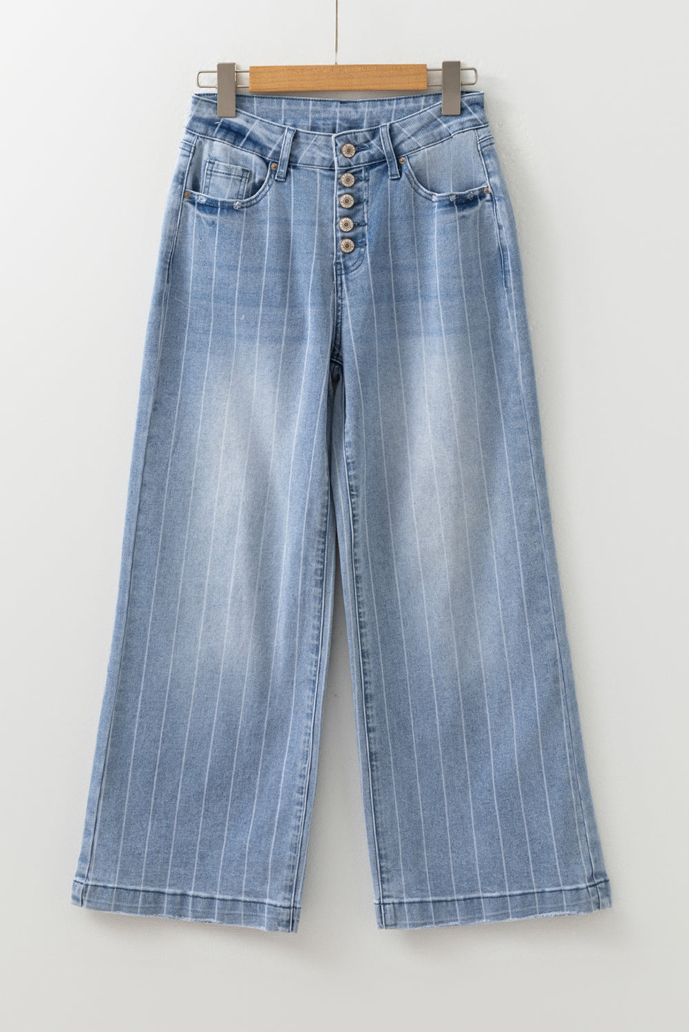 Blue wide leg jeans on model