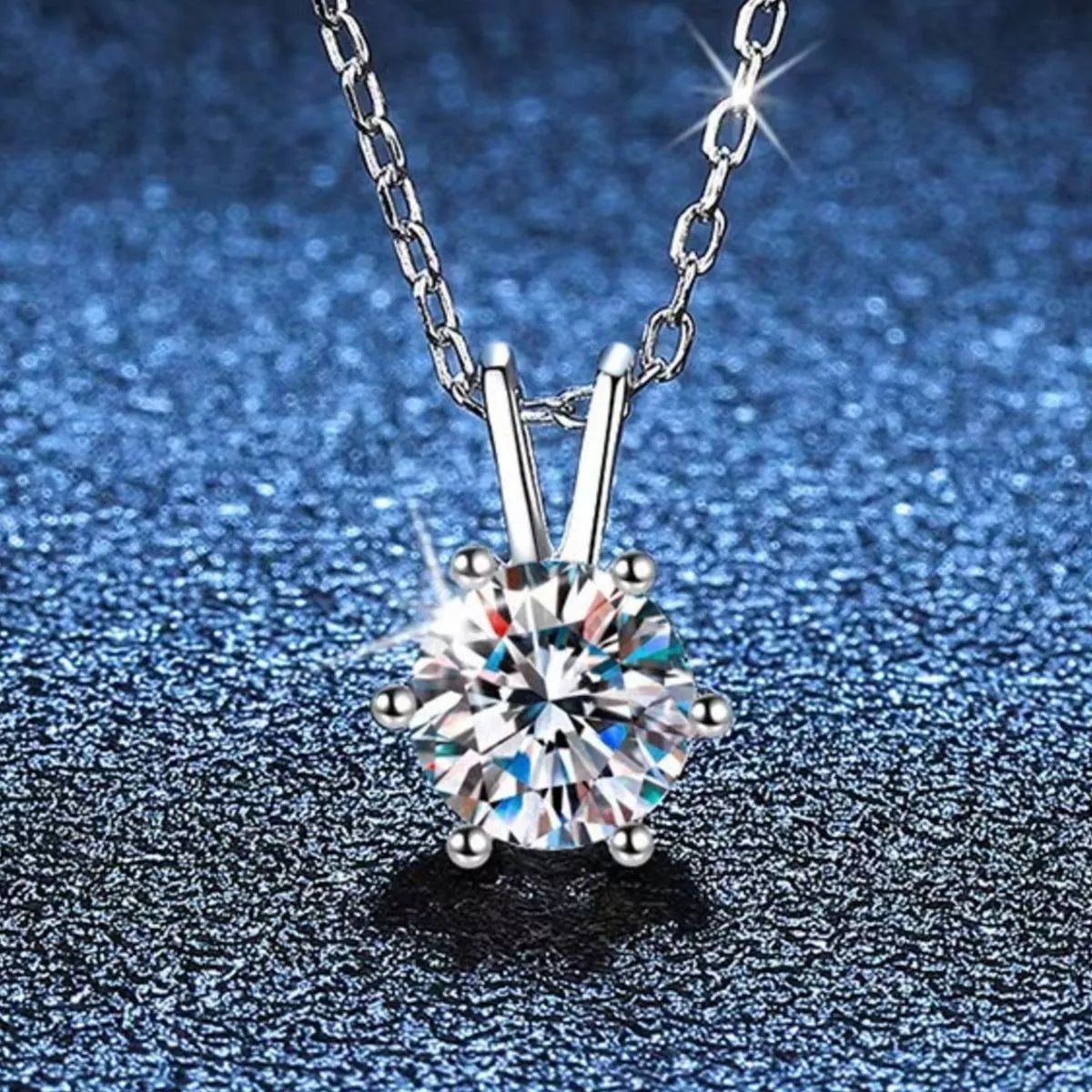 Close up of the 2 carat moissanite stone and prong setting
