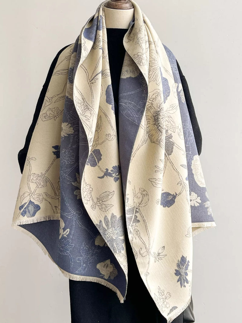 Floral print reversible scarf shown around the neck