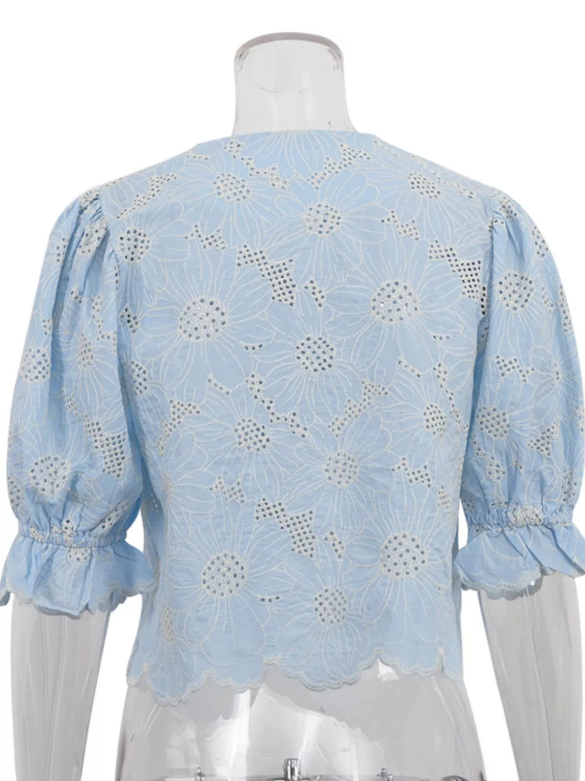 Embroidered flounce sleeve top styled look