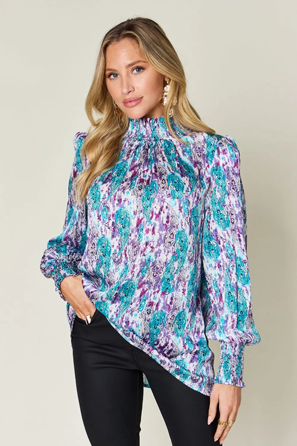 Frill blouse shown on a standing model
