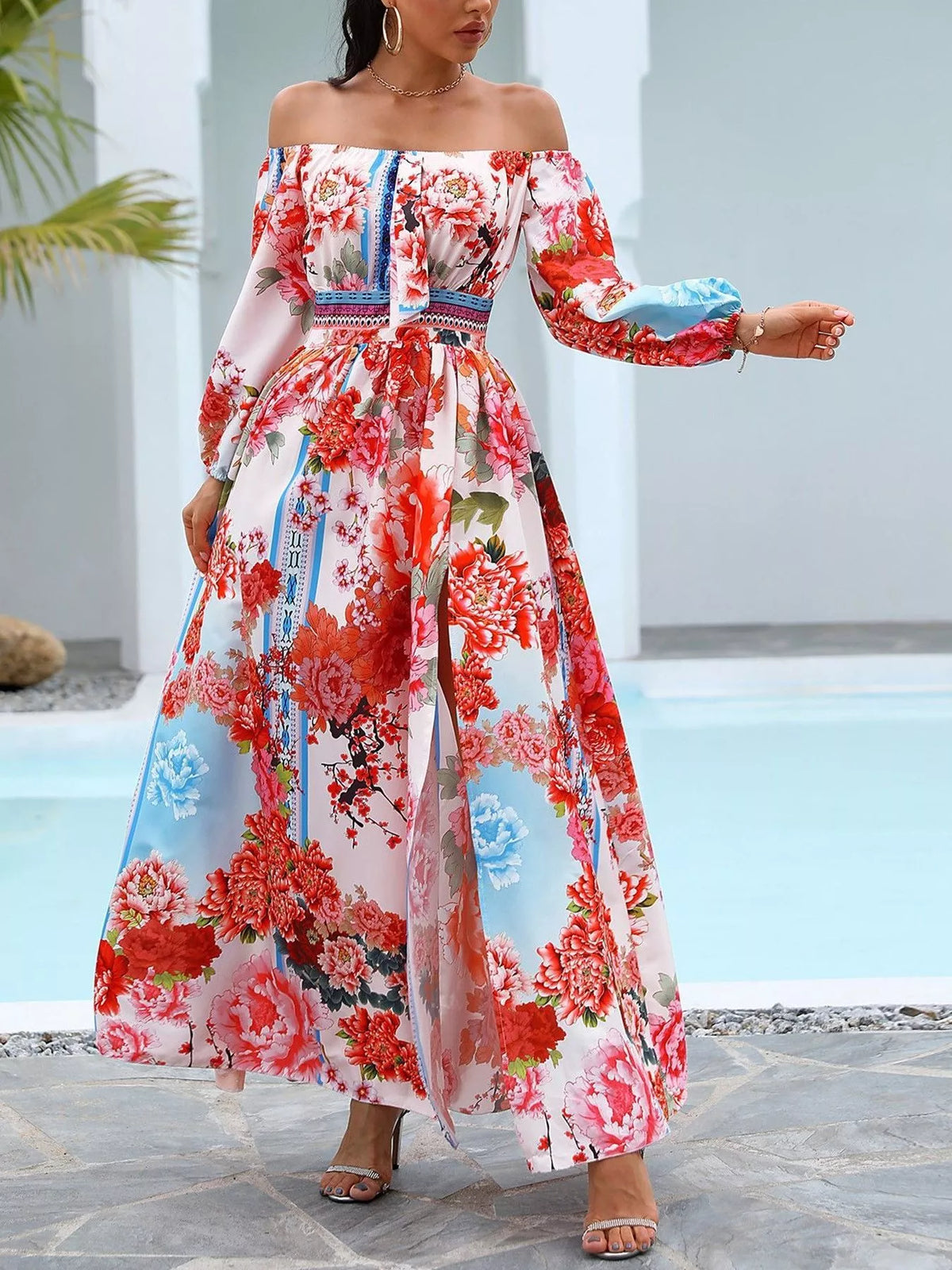 Fabric print detail of the off shoulder maxi dress
