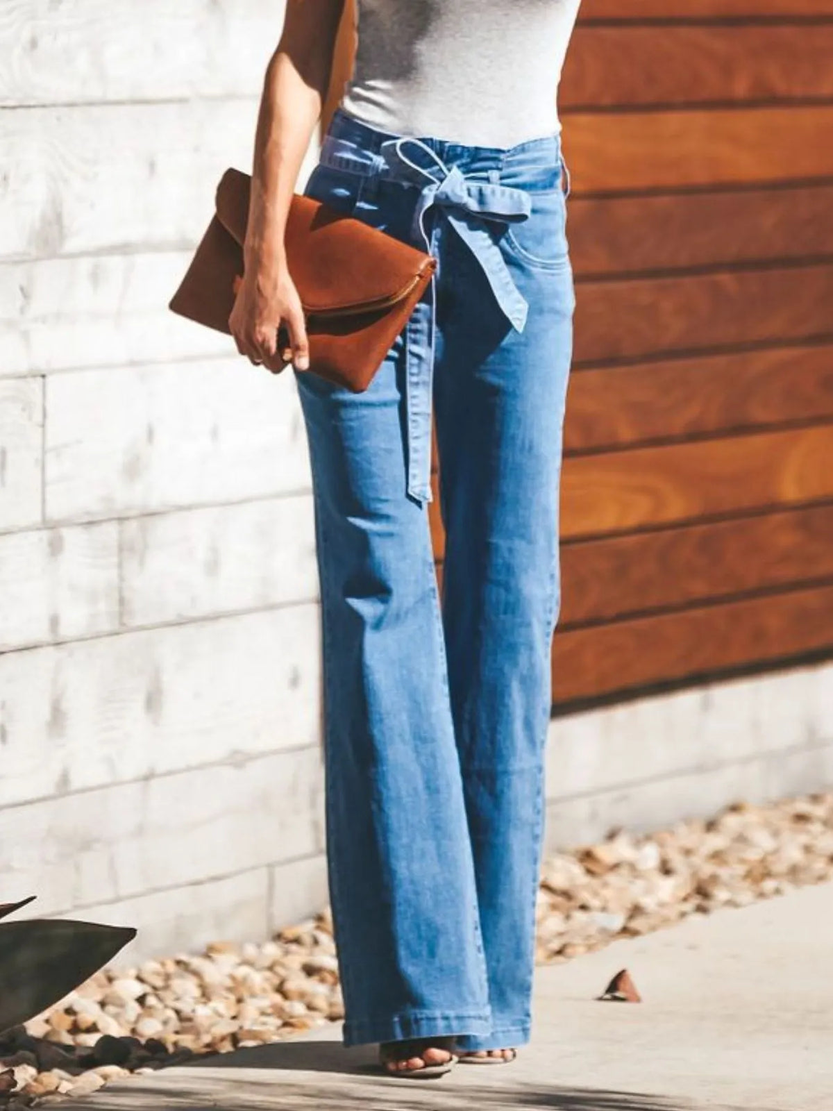 Light wash flare jeans styled full length