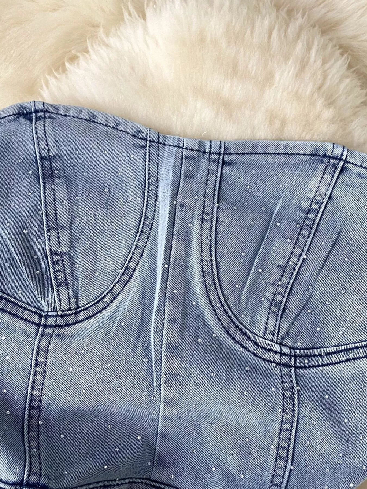 Blue strapless denim romper with diamante detail detail view