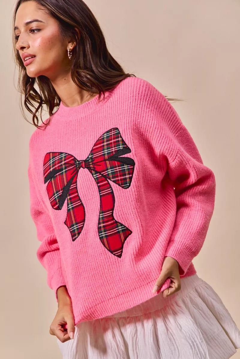 Checker Plaid Ribbon Christmas Sweater in Pink on model