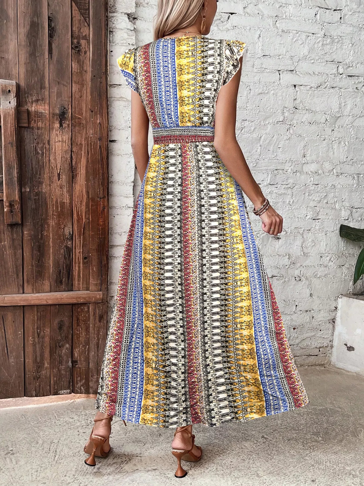 Boho print ruffle sleeve slit dress side view