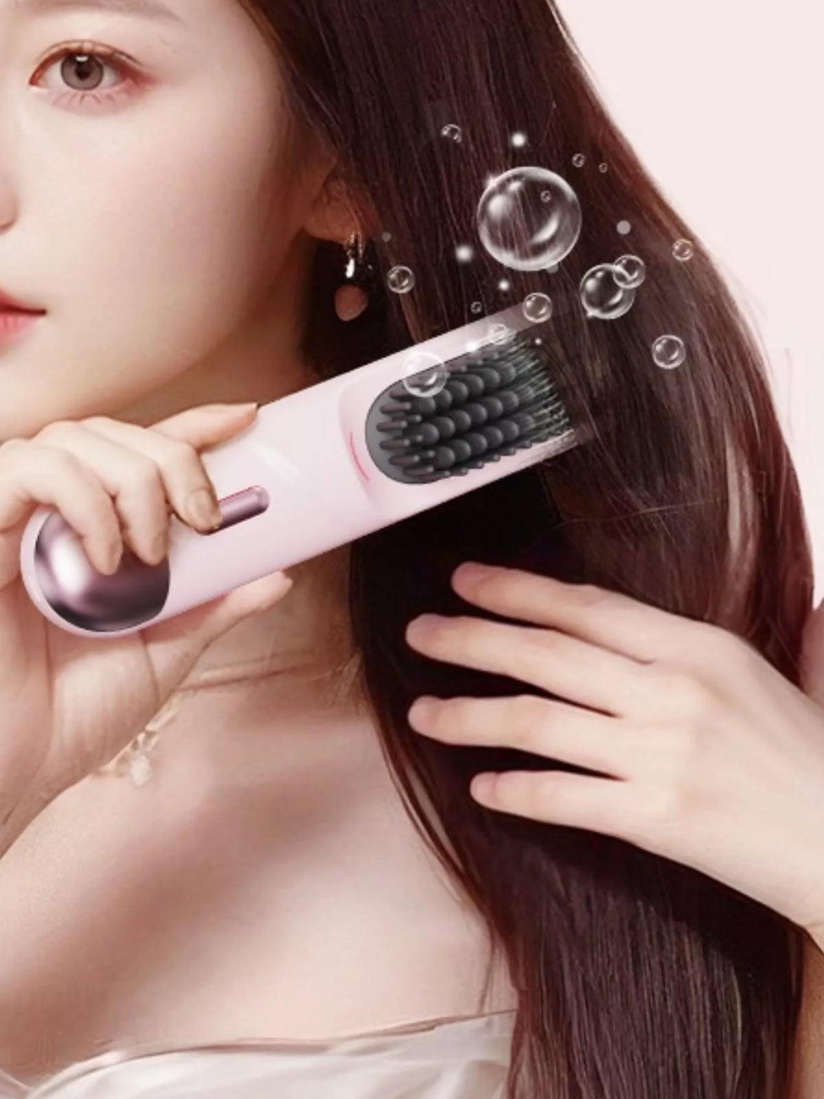 Heated hair straightening comb in pink