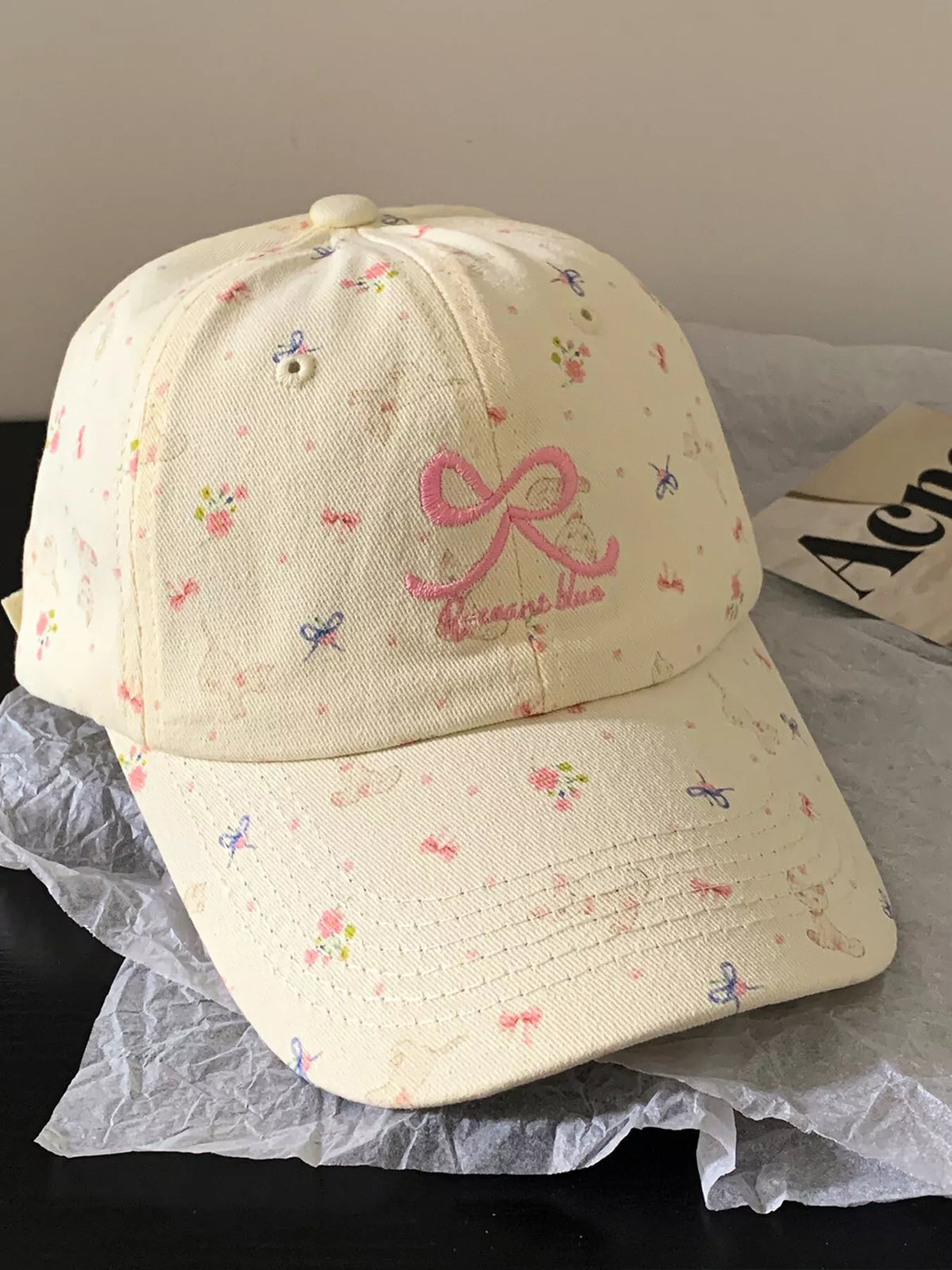 Side view of the adjustable cotton cap showing the brim