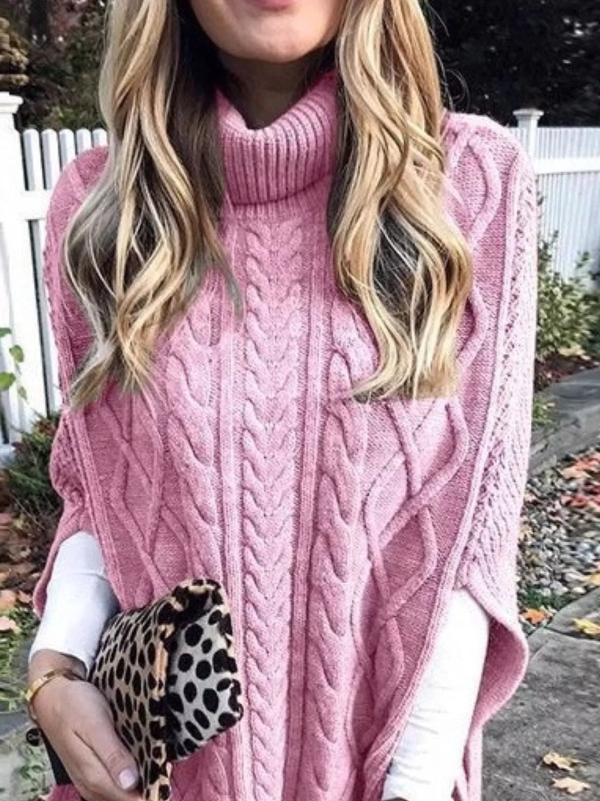 Chunky cable knit turtleneck poncho back view