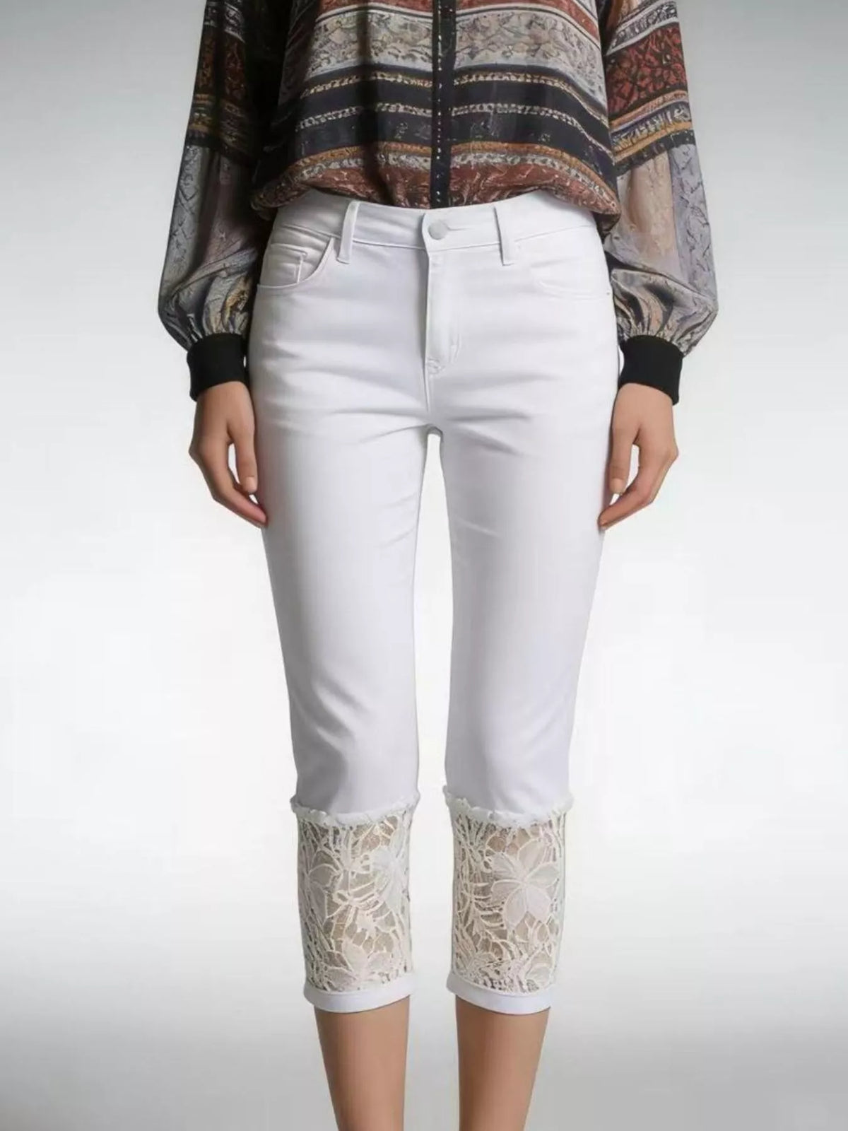 Capri jeans showing lace hem detail
