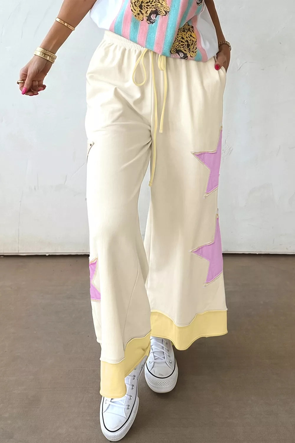 Star patch pants drawstring waist and pocket detail