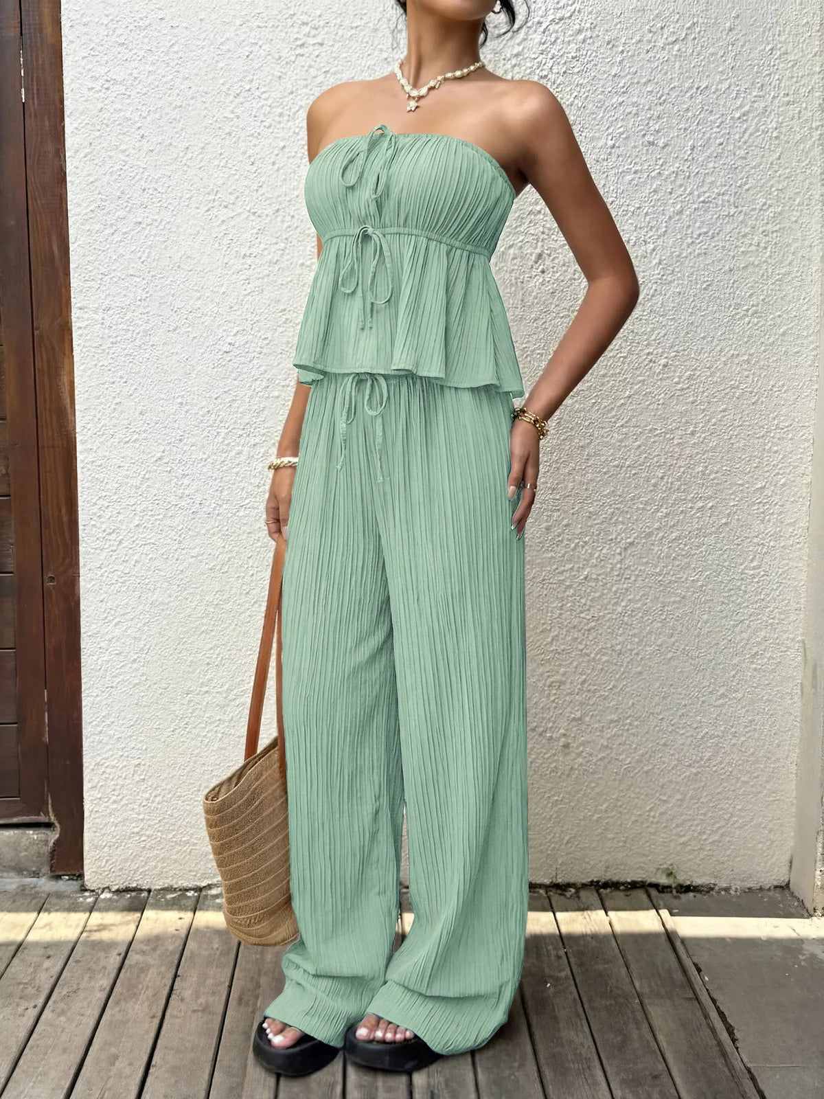 Coordinated tube top and wide leg pants outfit