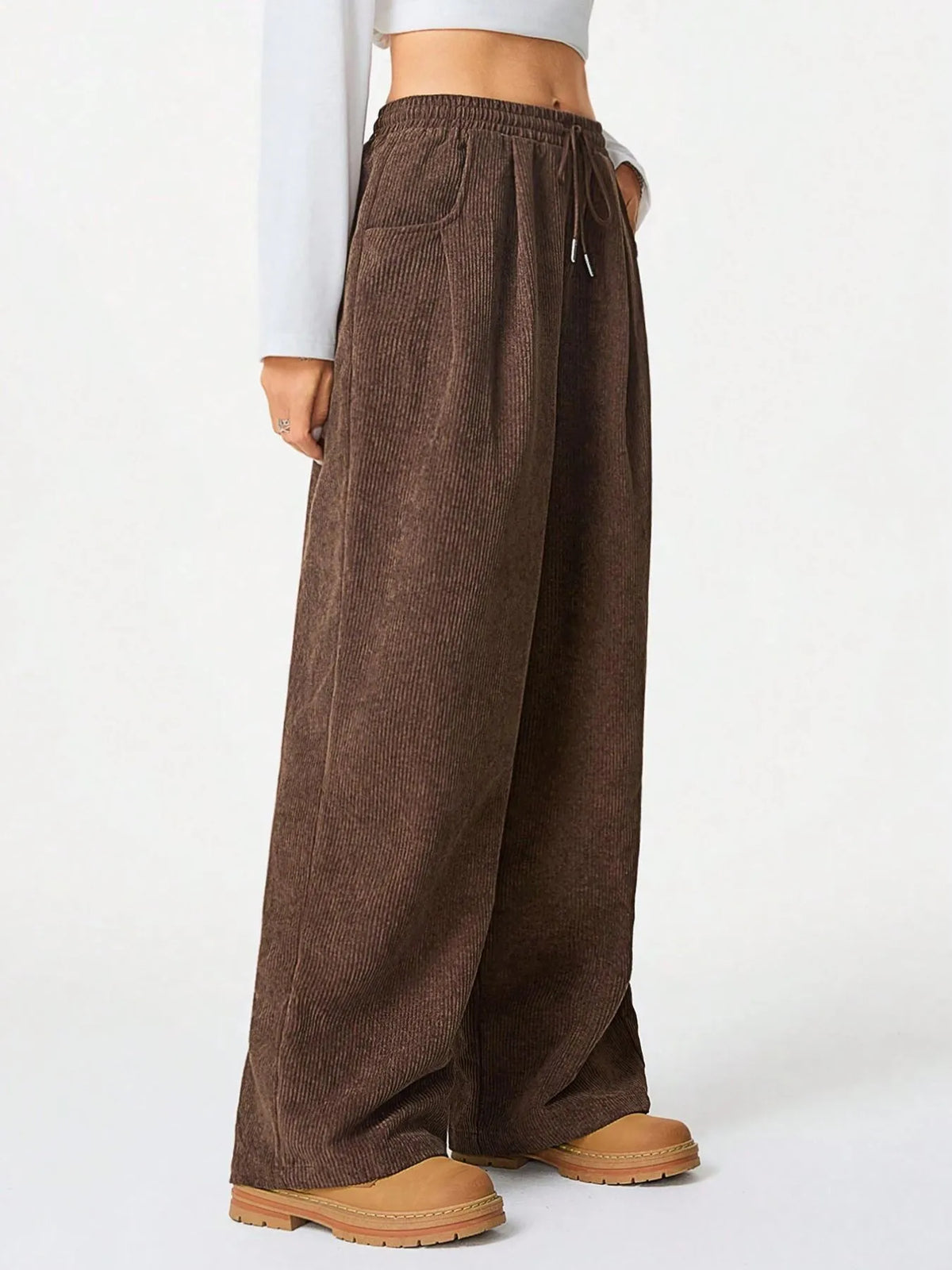 Drawstring wide leg pants fabric drape detail