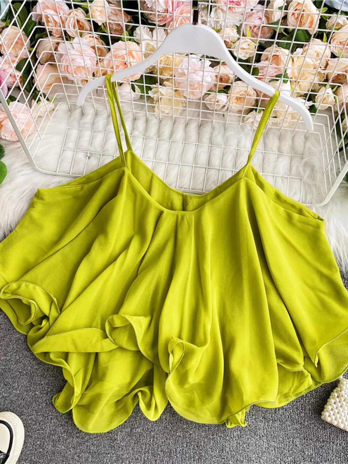 Ruffled flowy cami top fabric detail