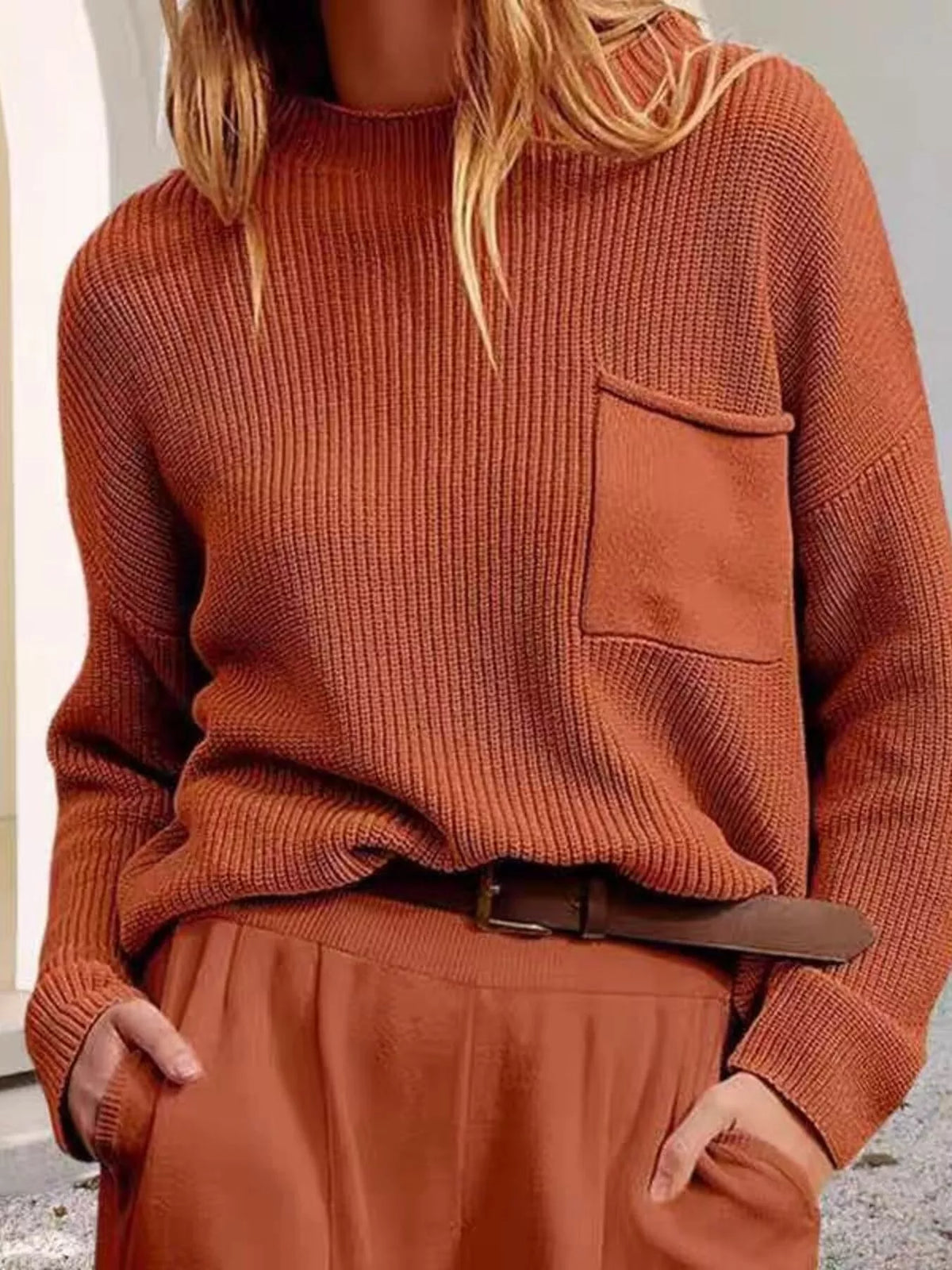 pocket detail dropped shoulder ribbed sweater worn with denim