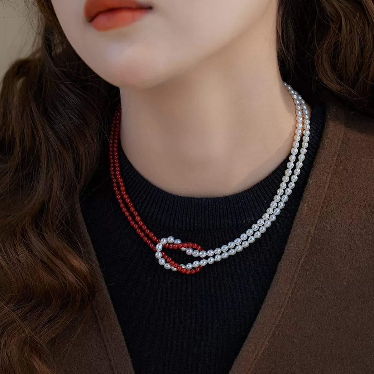 Layered pearl knot necklace detail