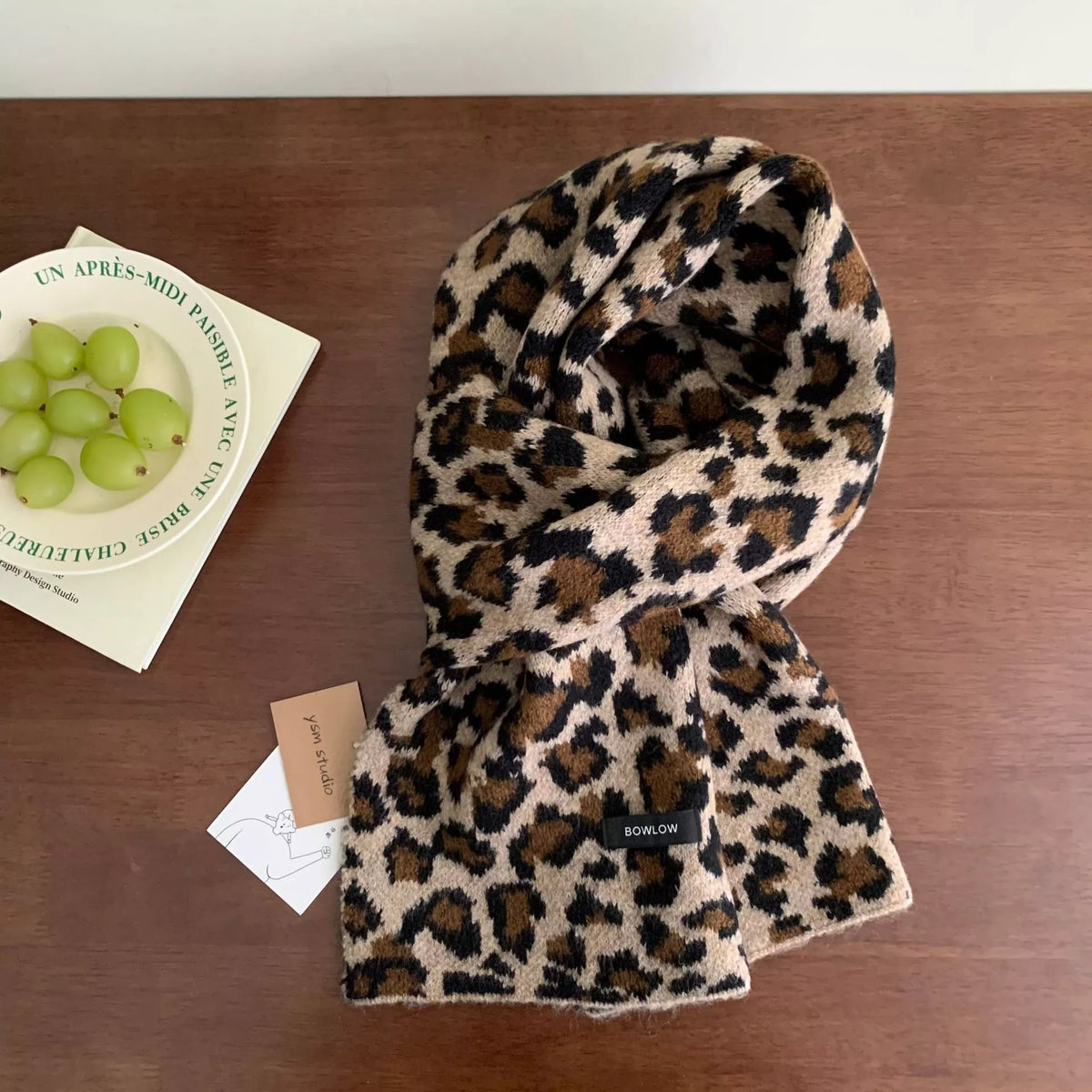 Animal print scarf shown in an alternate style
