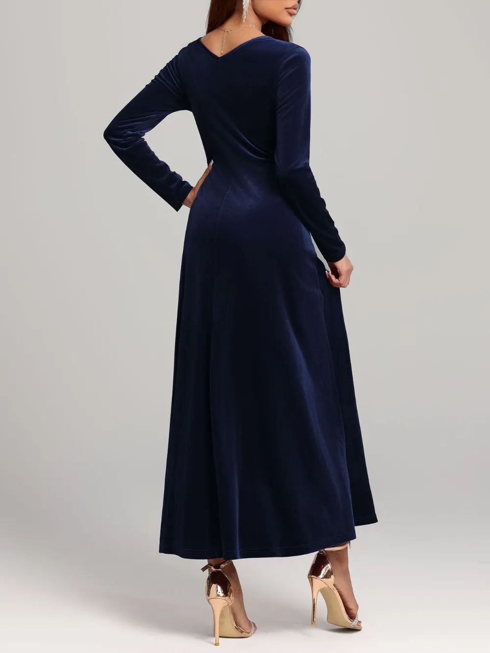 Fabric sheen detail on the velvet dress