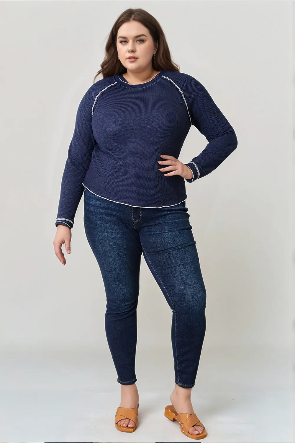 Raglan sleeve long sleeve top shown from the side