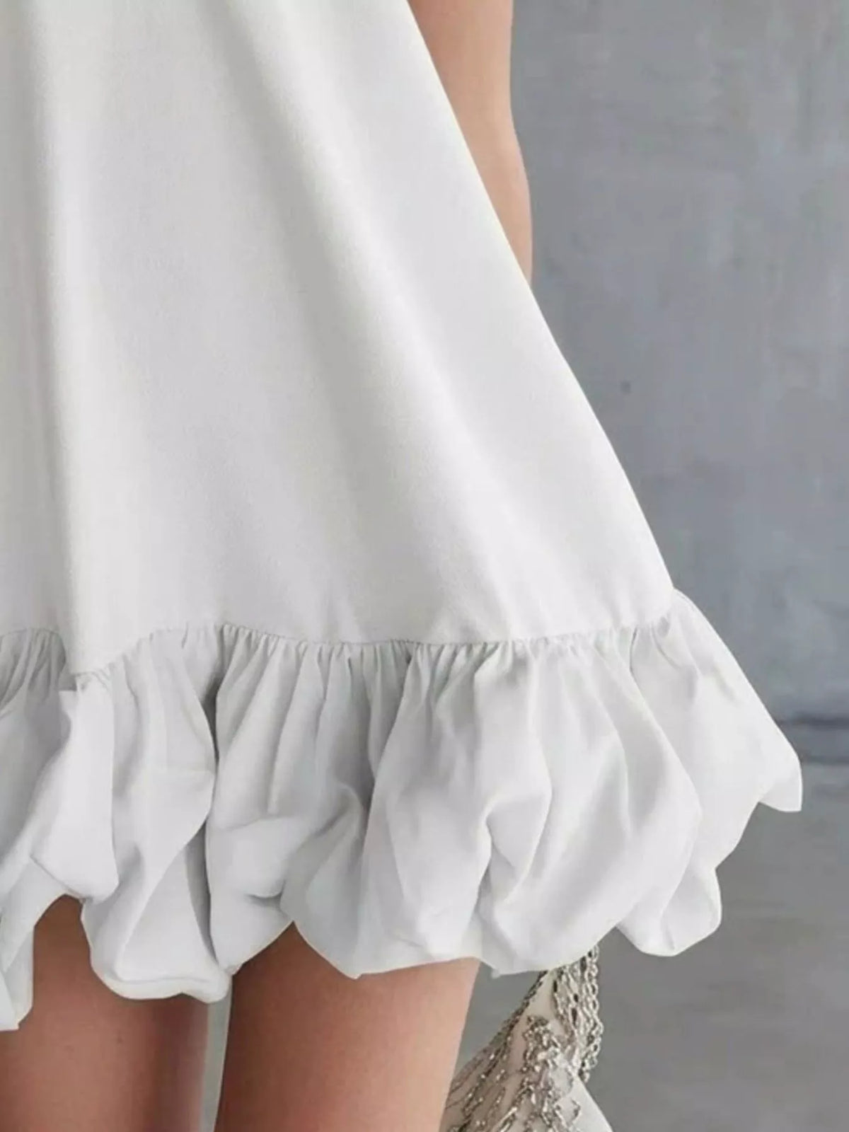 Bubble hem mini dress side view