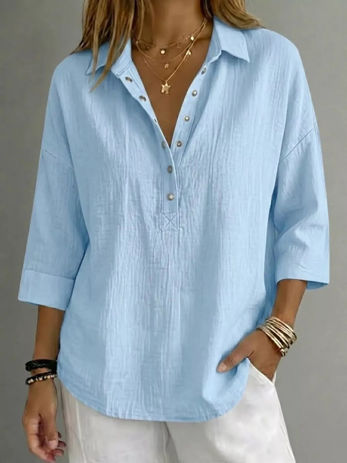 Close up of the snap front detail on the blouse
