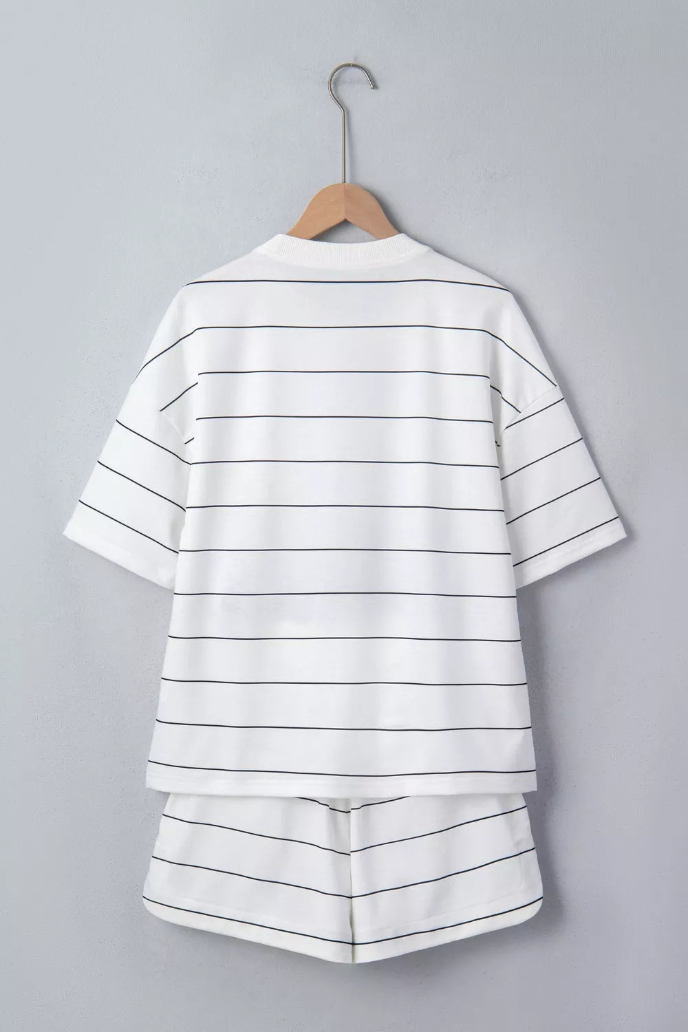 Stripe tee and drawstring shorts side view