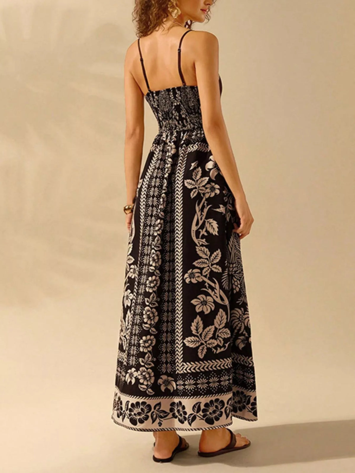 Spaghetti strap and neckline detail on the maxi dress