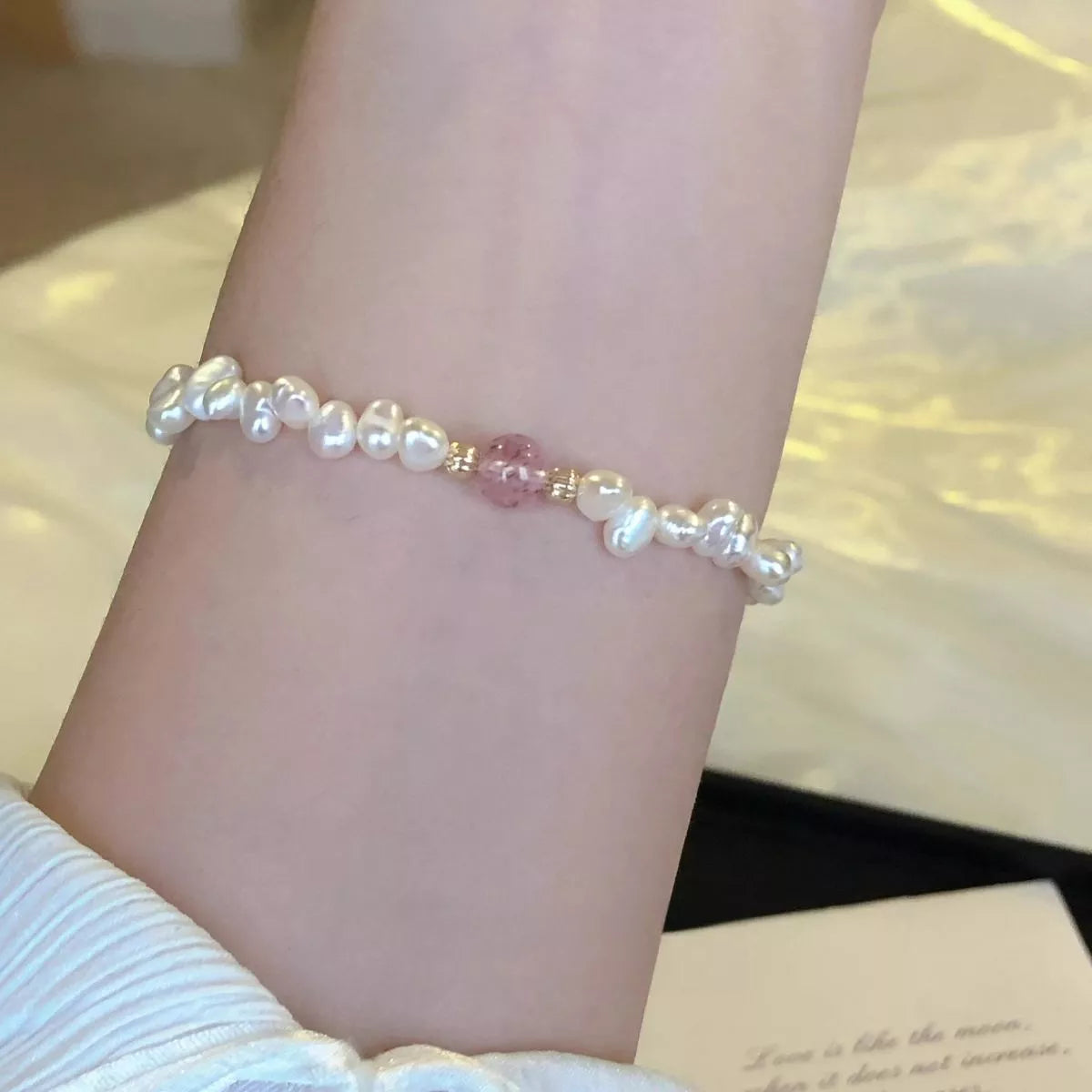 Blush pink pearl and crystal beaded bracelet, side view