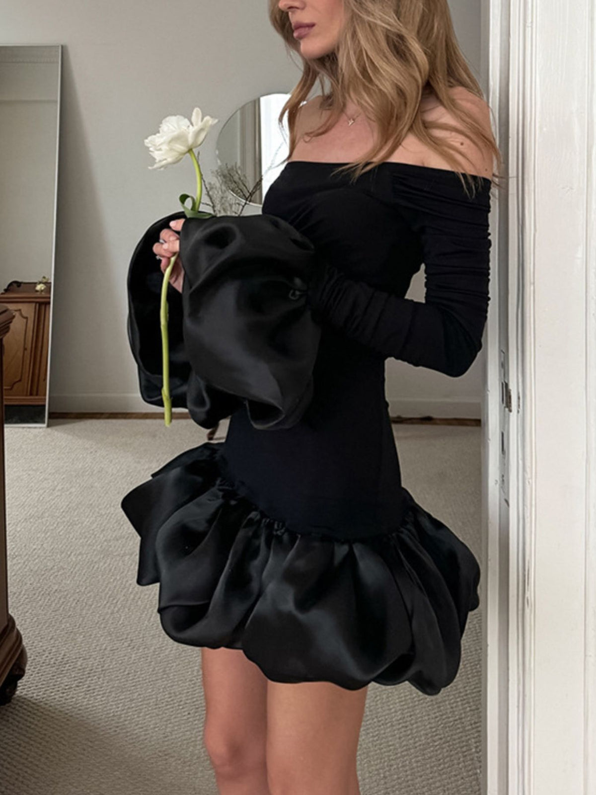 Black off shoulder ruffle hem mini dress back view