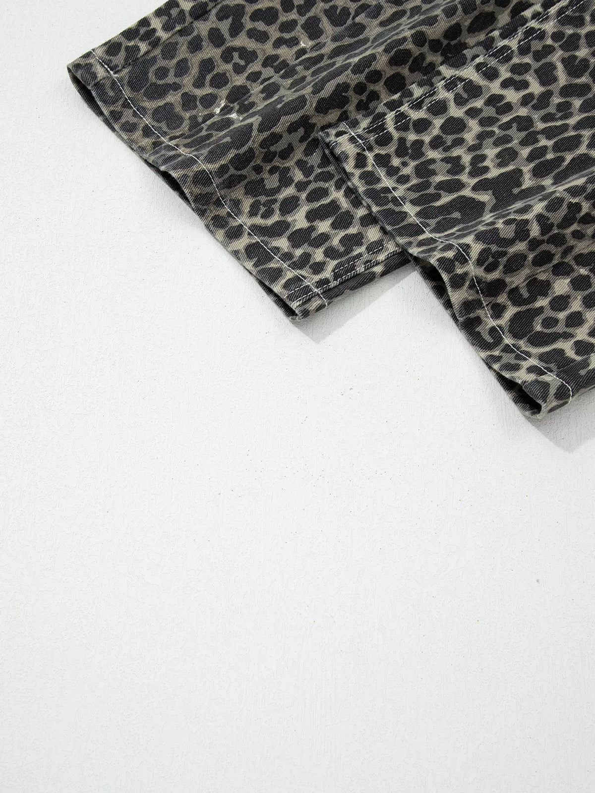 Leopard print jeans styled for a bold look