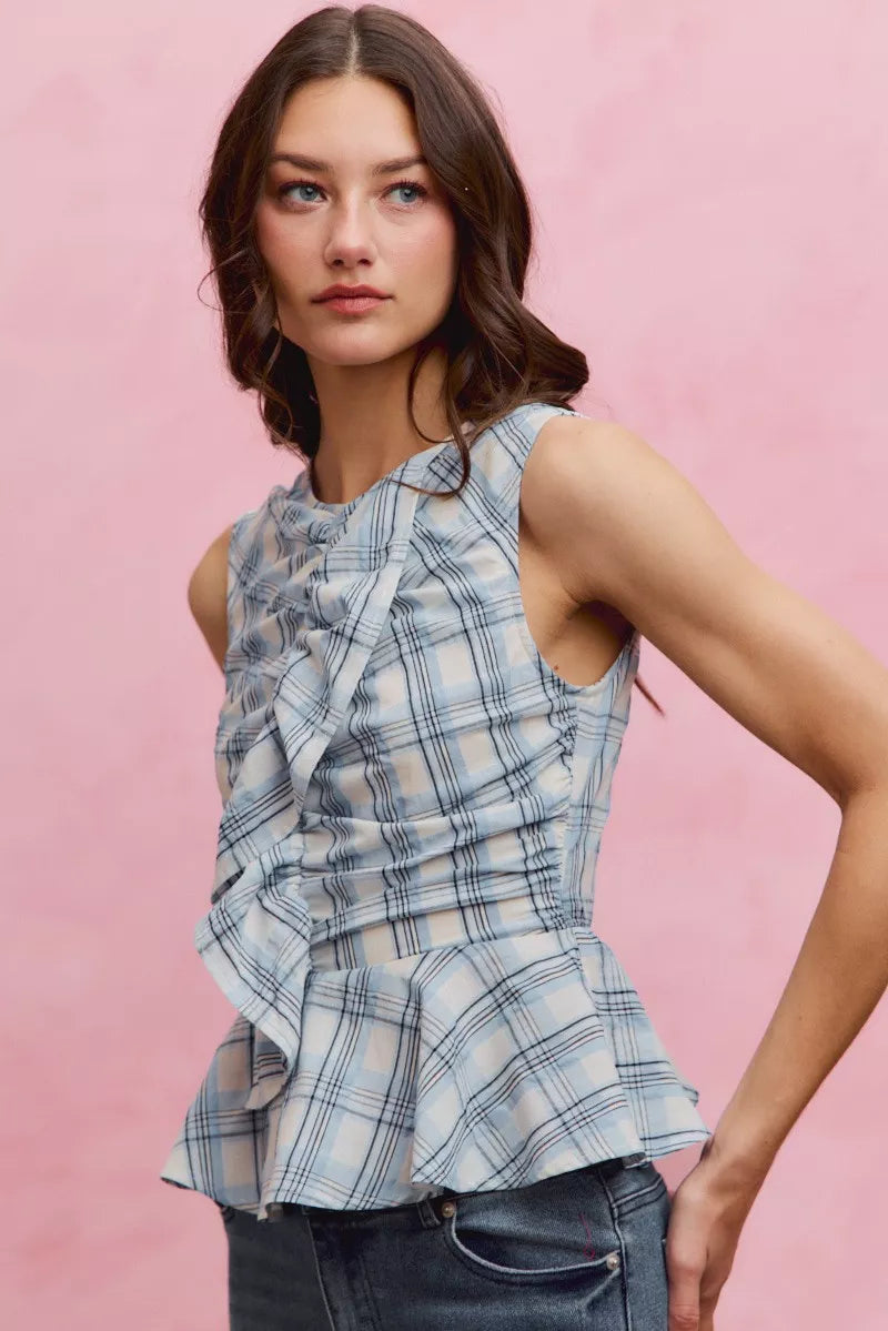 Blue plaid sleeveless ruffle peplum top front view