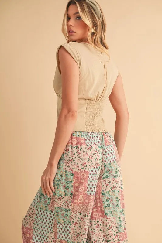 Mint pink printed pants styled outfit view