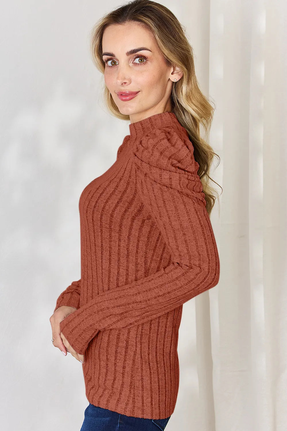 Puff sleeve ribbed top side profile view