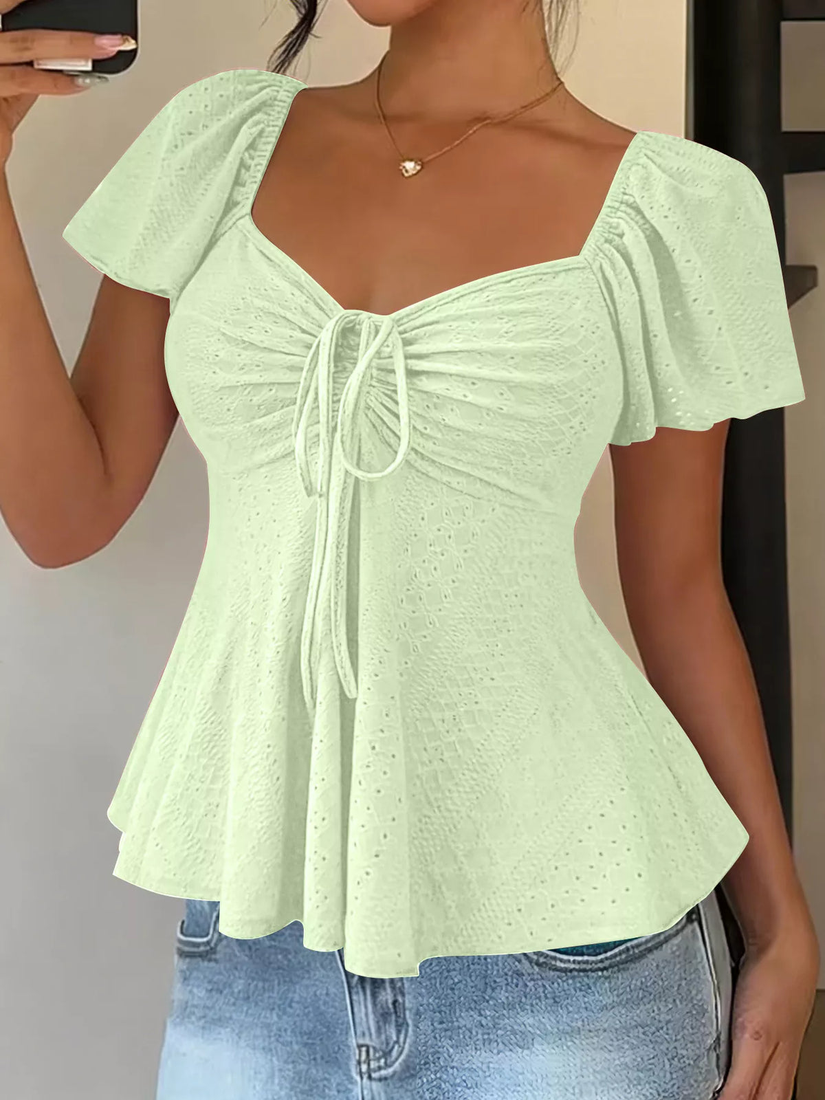 Casual top shown in black