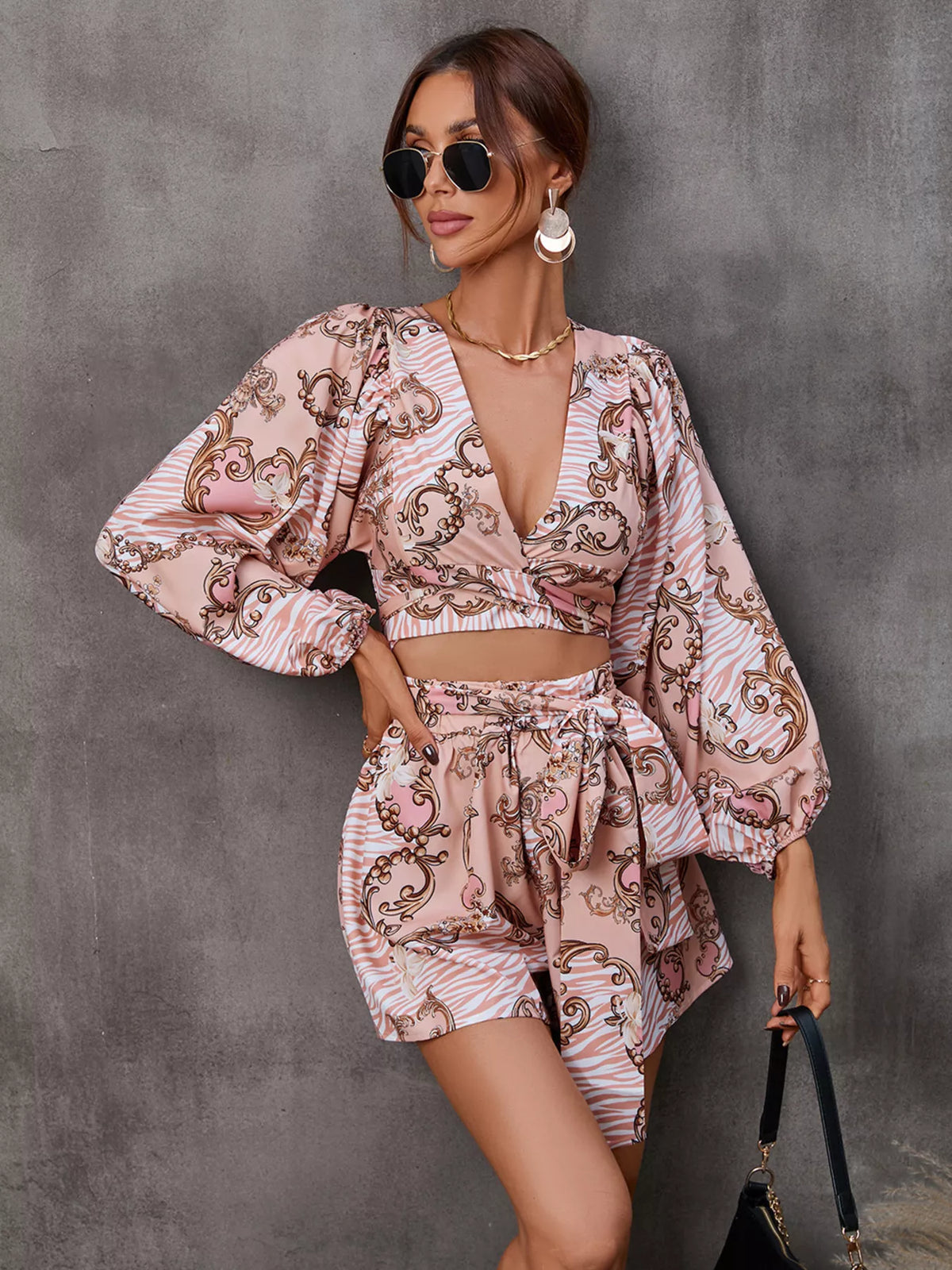 Long sleeve romper in dusty pink full length