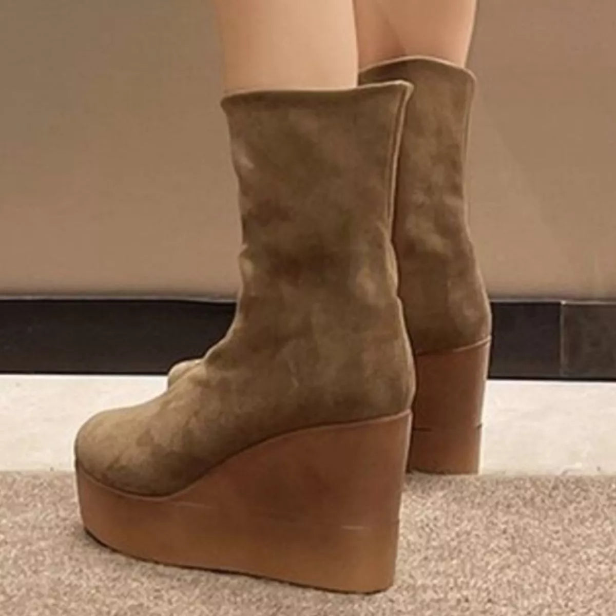 Round Toe Wedge Boots pair styled together