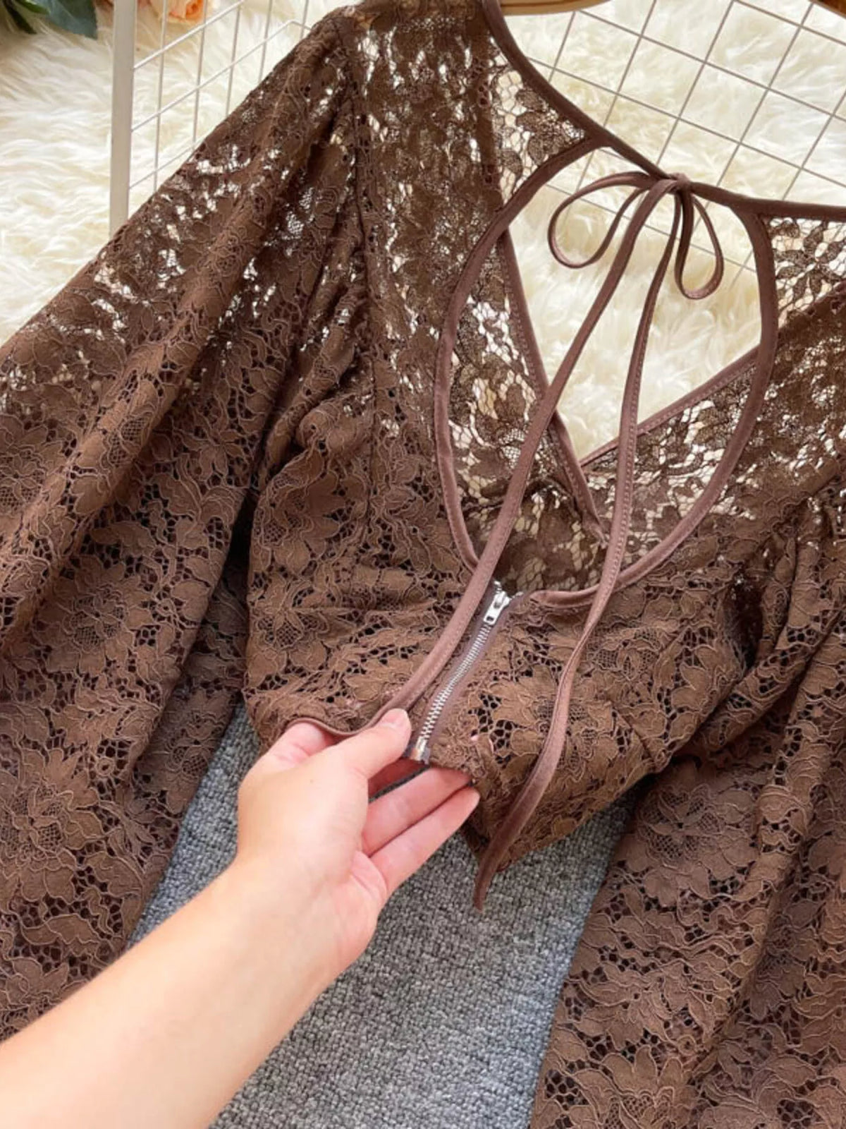 Lace tie back long sleeve top, full length view
