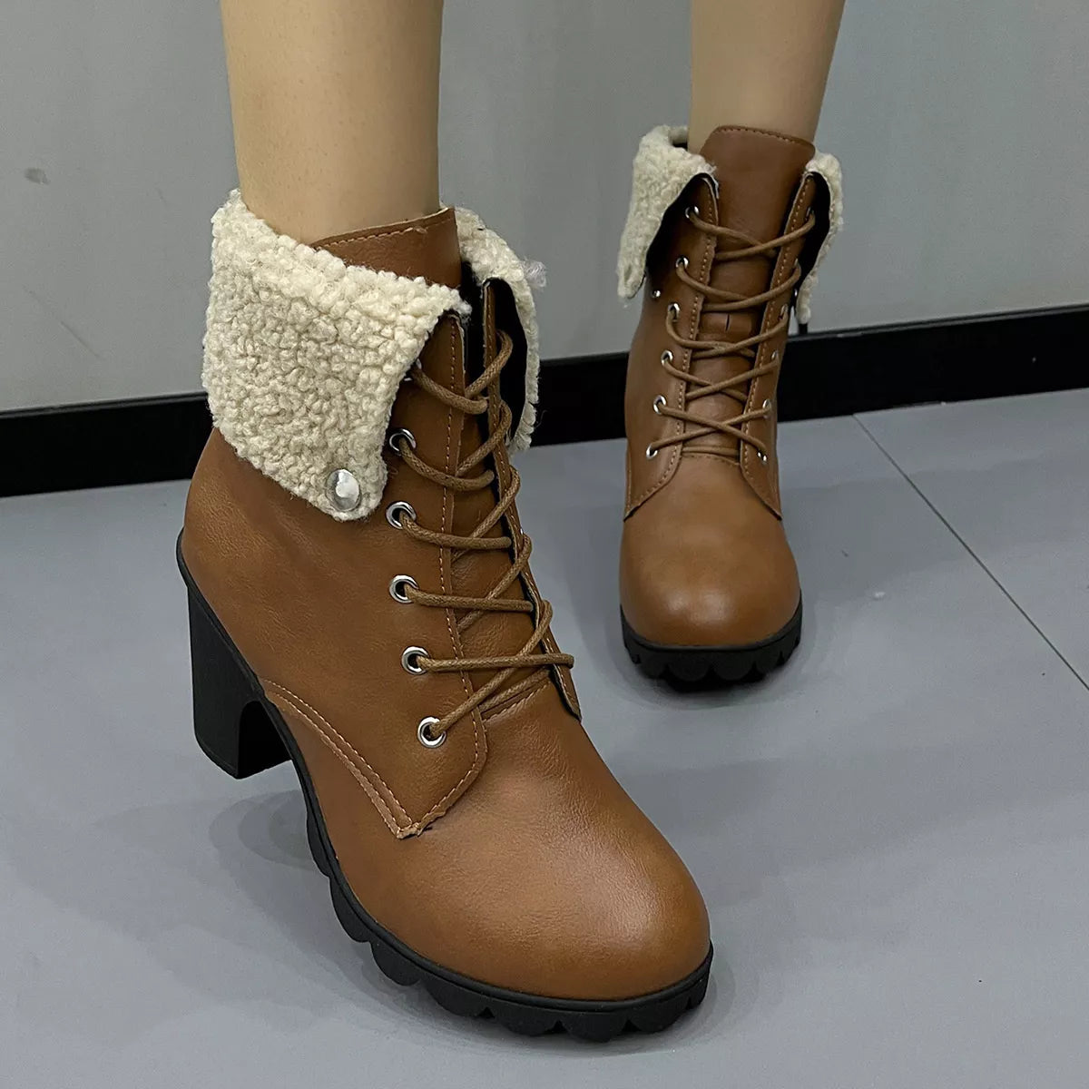 Lace up block heel boots sole and tread