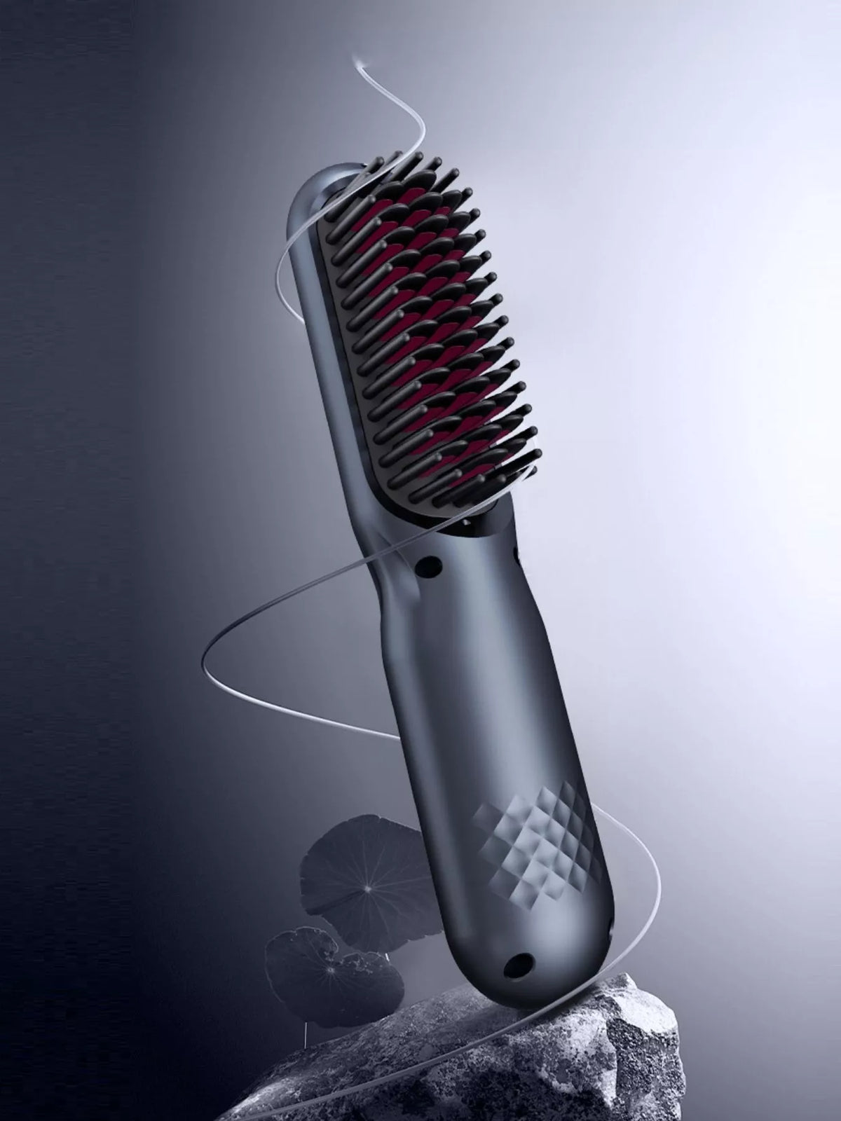 Heated comb held in hand