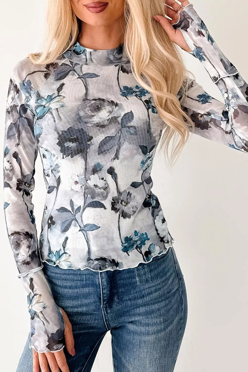High neckline detail on the long sleeve mesh top