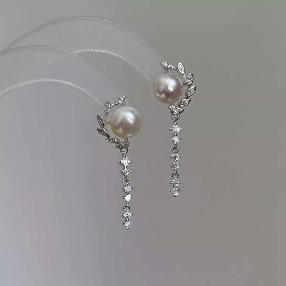 pearl and zircon silver drop earrings pearl close up