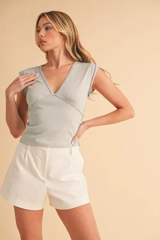 Light blue cropped top side view