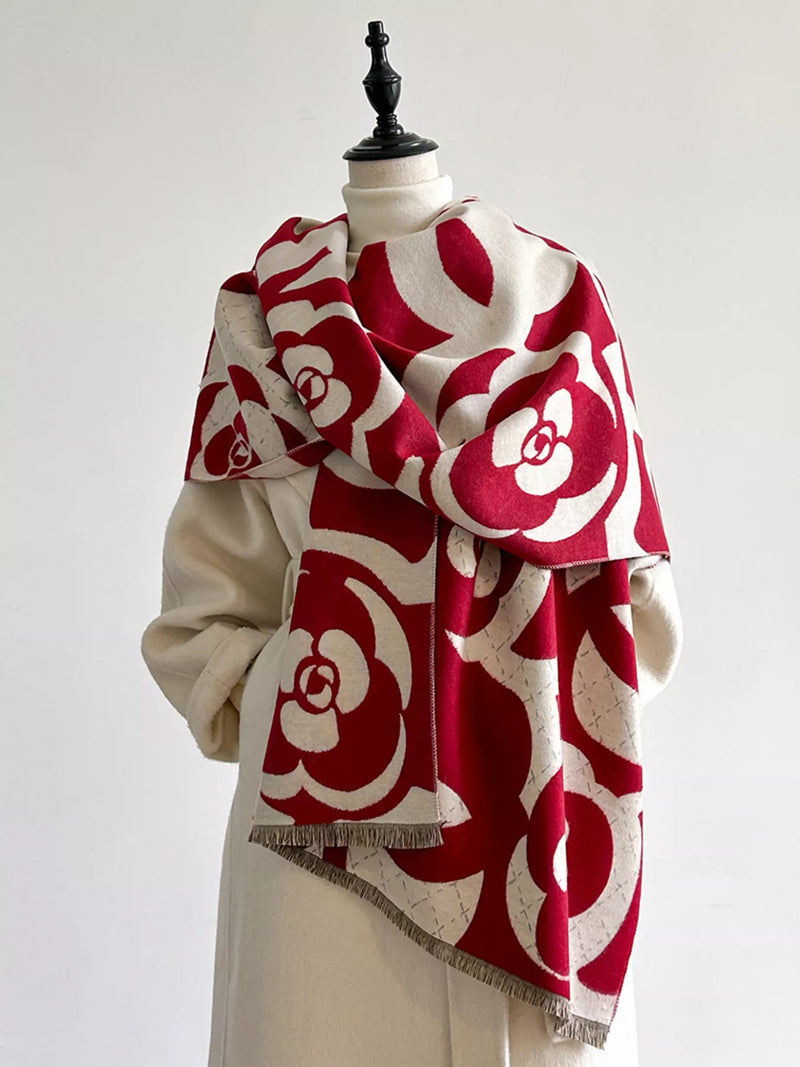 Floral patterned warm winter scarf draped around the neck