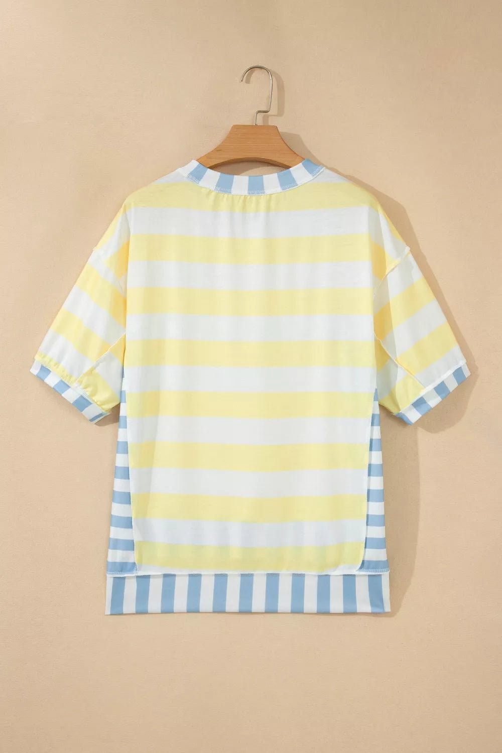 Back view of the striped light yellow half sleeve top