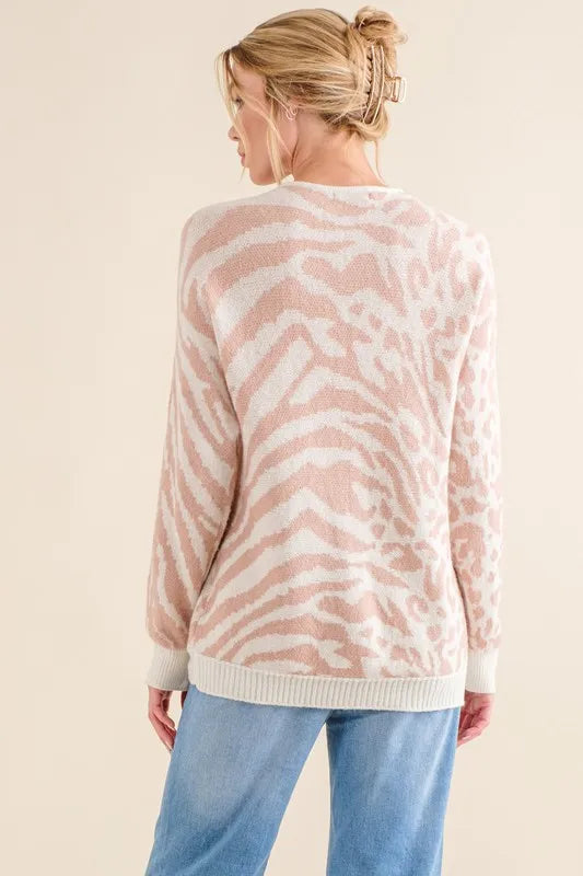 Leopard and Zebra Print Sweater Top in Pale Pink on model
